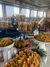 a buffet of food on a boat